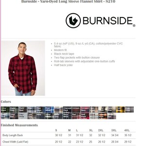 May include: A red and black plaid long-sleeve flannel shirt with a modern fit. The shirt has two flap pockets with button closures, roll-tab sleeves with adjustable one-button cuffs, and a half back yoke. The shirt is made of a cotton/polyester blend fabric. The size chart shows measurements in inches.