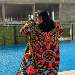 Black long Suzani Embroidered Kimono Coat made by artisans in India for Ornate Handicrafts. Style with jeans t-shirt for  a casual outfit or with a dress for a special party outfit.