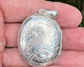 Victorian silver locket, 1880, Maltese cross and bird design