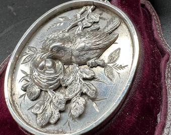 Rare Antique silver locket bird with nest in relief hallmarked