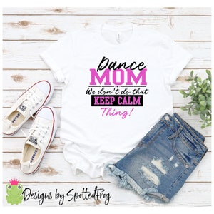 May include: White t-shirt with black and pink text that reads "Dance Mom We don't do that Keep Calm Thing!"