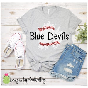 May include: Gray t-shirt with a white baseball graphic and the text "Blue Devils" in black. The baseball graphic has red stitching.