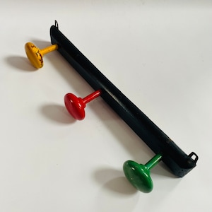 Atomic 1950s Mid Century Modern Triple Coat Hook Rack Bright Colours Red yellow Green Solid Vintage Interior Design
