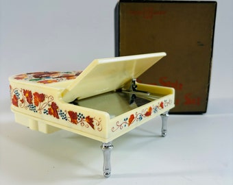 Briquet musical miroir pour piano TOYO en bakélite japonais des années 1950, marque orientale, dans sa boîte d'origine (restauration nécessaire) - Le couvercle reste ouvert
