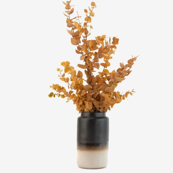 Bouquet of yellow stabilized eucalyptus sustainable interior decoration floral composition table decoration