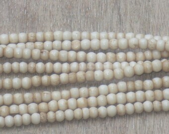 18 strand of Tea Dyed Heishi Bone Beads 3x5mm Antiqued bone beads. Carabao bone beads hand-made in the Philippines