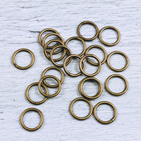 8mm Antique Brass Closed Jump Rings, Pick Amount