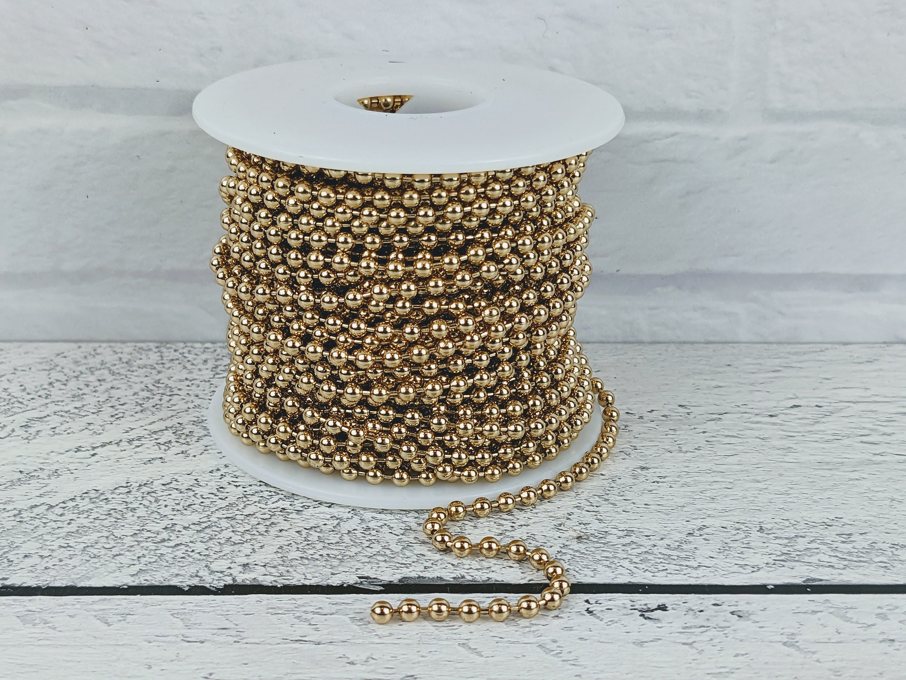 Cage chain store gold plated