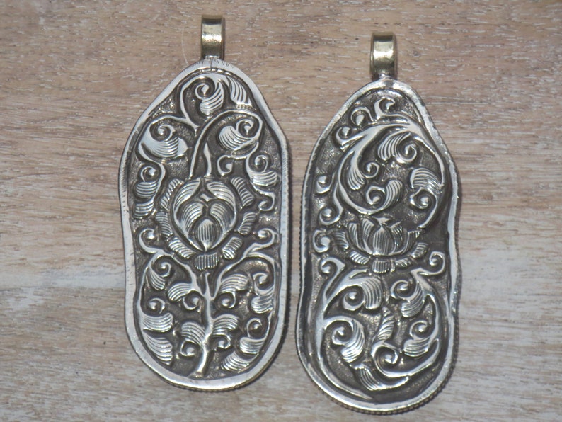 Tibetan Silver and Ox Bone Carved Ganesh Elephant Repousse Pendant Tibet Pendant Ganesha Lotus Flower Nepal Namaste