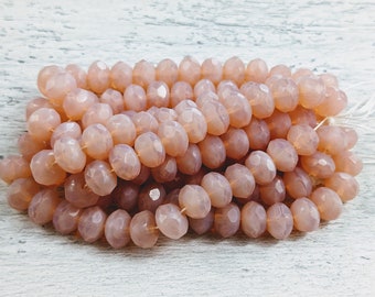 Perles rondes à facettes en opale rose en verre tchèque, 8x6mm, 25pcs.