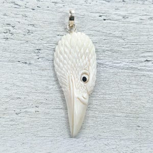 Hand Carved Water Buffalo Bone Ravens Head Pendant, Bird, 58x22mm