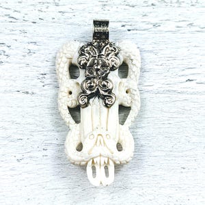 Tibetan Silver and Buffalo Bone Carved Longhorn Skull with Double Snake Ornate Pendant, Nepal, 70x38mm