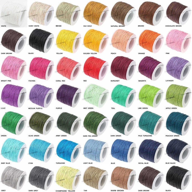 May include: A collection of 36 spools of waxed cotton cord in various colors, including white, black, yellow, red, green, blue, and brown. Each spool is labeled with the color name.