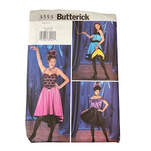 May include: A vintage Butterick sewing pattern, number 3553, featuring three dress designs. The cover displays images of the finished garments: a pink and black dress, a blue and yellow dress, and a purple and black dress. The pattern includes size information.