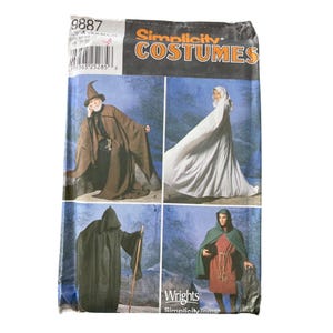May include: Simplicity Costumes pattern featuring four costume designs: a wizard, a hooded cloak, a white hooded cloak, and a medieval-style outfit. The pattern includes the number 9887 and the Wrights Simplicity Trims logo.
