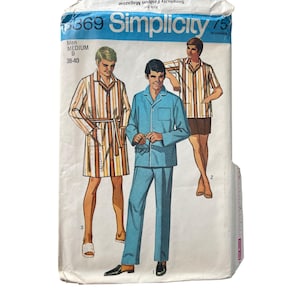 May include: Vintage Simplicity sewing pattern for men's sleepwear. The pattern features three different pajama styles: a robe, a pajama set, and a short-sleeved shirt with shorts. The pattern is for a medium size, with a chest measurement of 38-40 inches.