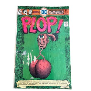 May include: Vintage comic book cover for "PLOP!" featuring a cartoon character with a long tongue and two large, round, red appendages. The cover is green with the title in pink and the DC Comics logo.