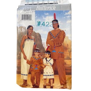 May include: A Butterick sewing pattern envelope, number 4171, featuring illustrations of four individuals wearing tan, fringed costumes with blue and red geometric trim. The package includes a barcode, size charts, and text labels for styles A, B, C, and D.