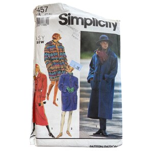 May include: A Simplicity sewing pattern envelope, number 8457, featuring illustrations of various coats. The designs include a patterned hooded coat, a solid blue coat with toggle closures, and a long red coat. The text includes Simplicity, Easy Sew, and size PT-XL.