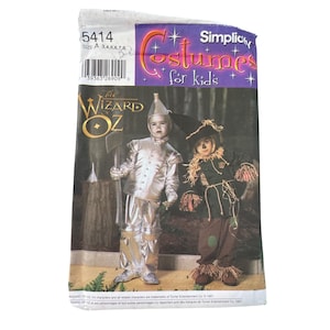 May include: Simplicity costume pattern for kids featuring The Wizard of Oz characters. The pattern includes instructions for making a Tin Man and a Scarecrow costume. The pattern size is A 3,4,5,6,7,8.