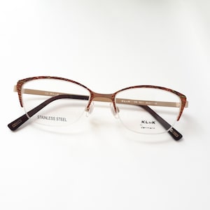Kliik Denmark 638 211 eyeglasses women gold metal half rim angular glasses small size Kliik Denmark new neu Brille