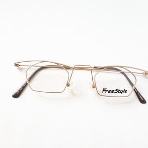 Argenta Freestyle 712 eyeglasses gold polygonal womens mens unisex glasses small size thin flexible glasses 90s NOS neu Brille
