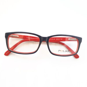 May include: Black and red rectangular eyeglasses with a red frame and black arms. The brand name "POLAR EYEWEAR" is printed on the right lens.