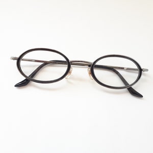 Baeksan 5801 eyeglasses Hakusan Lady Gen silver black oval metal women men glasses from Korea medium size 21 KGP 백산안경 new neu Brille