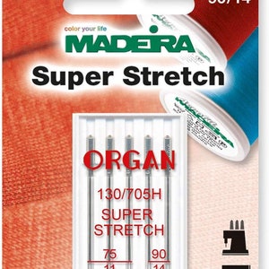 May include: A package of Organ Super Stretch sewing machine needles for stretch fabrics. The package is white with red and black text. The needles are labeled 75/11 and 90/14. The package also includes the text "130/705H Super Stretch" and "www.madeira.com".