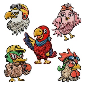 May include: Embroidered patches featuring cartoon birds: an eagle with goggles, a pink bird with a bow, a parrot with a scarf, a duck with sunglasses and a rooster with goggles. Each patch has sequin detailing.