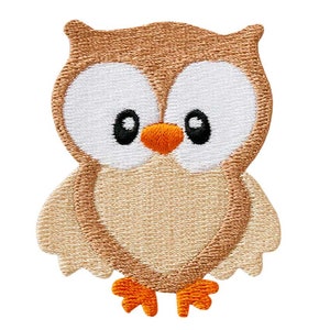 May include: A brown and beige embroidered owl with large white eyes and an orange beak. The owl has small orange feet.