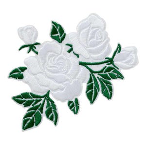 May include: Embroidered white rose patch with green leaves and stems. The patch features two open roses, buds, and detailed green leaves. This floral patch is ideal for adding a decorative touch to clothing or accessories.