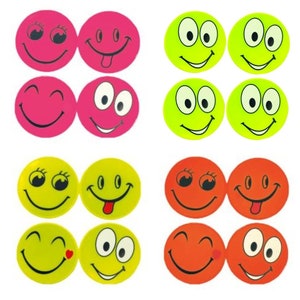 May include: Set of 12 colorful smiley face stickers. The stickers are round and feature various expressions, including winking, tongue sticking out, and closed eyes. The stickers are perfect for adding a touch of fun to any project.