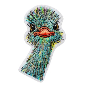 May include: Embroidered patch of an ostrich head with a blue, green, and yellow feathered neck and a bright orange beak. The ostrich has large brown eyes.