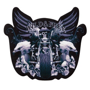 May include: A black and white motorcycle patch with a skull riding a motorcycle, wings, and the text "WILD & FREE".
