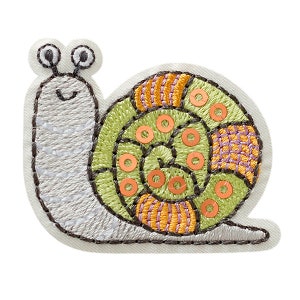 May include: Embroidered snail patch with a green, orange and purple shell. The snail has a white body with black eyes and a smiling mouth.
