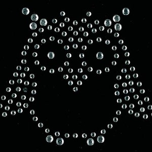 May include: A silver rhinestone owl design. The owl is made of small, round rhinestones that are arranged in the shape of an owl. The owl has large, round eyes and a small beak.