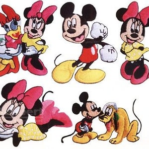 May include: Set of five iron-on patches featuring cartoon characters. The patches include Mickey Mouse, Minnie Mouse, and a cartoon duck. The patches are colourful and have a variety of designs.