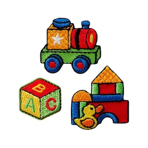 May include: A set of three embroidered iron-on patches featuring a toy train, a block with the letters A, B, and C, and a toy house with a duck.