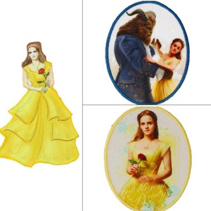 May include: Three embroidered patches featuring characters from the movie Beauty and the Beast. The first patch shows Belle in a yellow dress holding a red rose. The second patch shows Belle and the Beast dancing. The third patch shows Belle in a yellow dress holding a red rose with the text "Intelligent Beauty" below her.