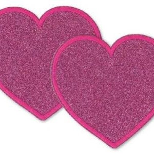 May include: Two heart-shaped patches with a glittery pink surface and a darker pink border. The patches overlap, creating a romantic design. Ideal for crafts or adding flair to clothing. Each patch is approximately 10 cm wide.