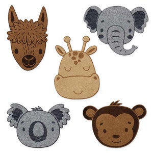 May include: Five felt animal head appliques in various colors. The appliques include a brown llama, a brown giraffe, a gray elephant, a gray koala, and a brown monkey.