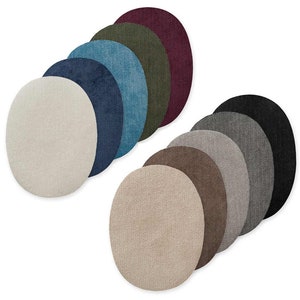 May include: Assortment of 10 round fabric swatches in various colours, including beige, brown, grey, black, blue, and green. The swatches are arranged in two rows, with five swatches in each row.