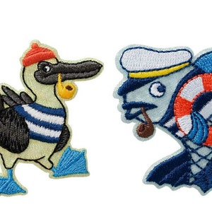 May include: Two embroidered iron-on patches featuring a blue and white striped bird wearing a red hat and a blue fish wearing a sailor hat and holding a life preserver.
