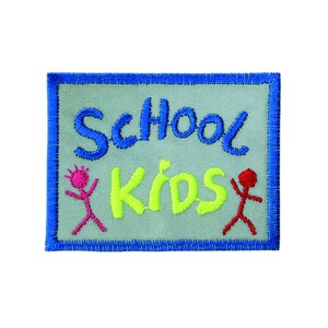 May include: A blue and white embroidered patch with the text "School Kids" and two stick figures, one red and one pink.