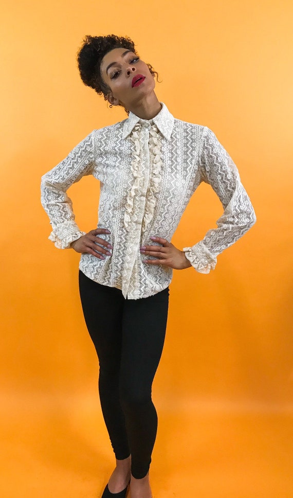 cream ruffle shirt