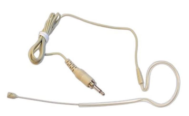 May include: A beige headset microphone with a 3.5mm audio jack. The microphone has a small, rounded head and a thin, flexible boom. The cable is coiled and secured with a white band. The headset is designed for hands-free audio input.
