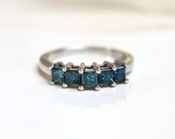 14 Karat White Gold Blue Diamond Ring