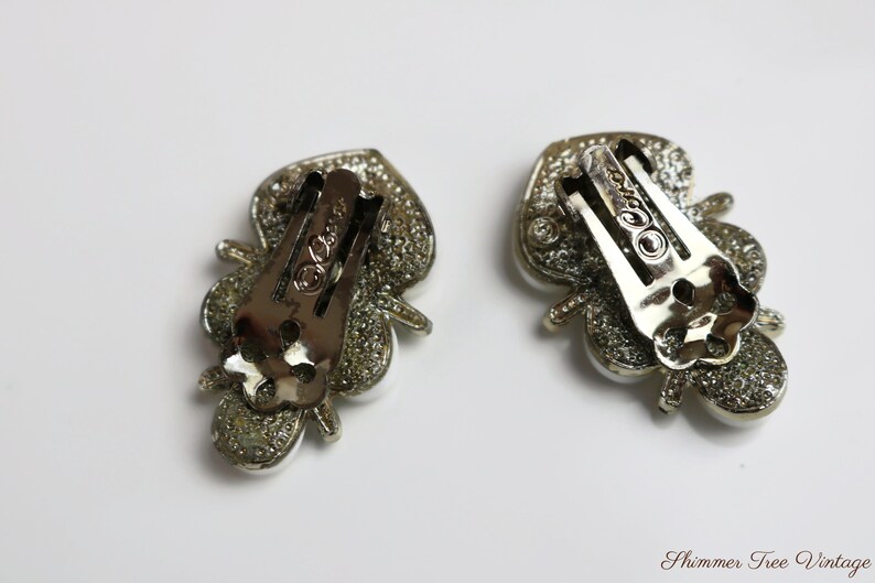 CORO White Thermoset Lucite and silver tone Clip on Earrings