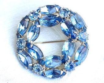 Broche couronne ouverte vintage en cristal bleu scintillant